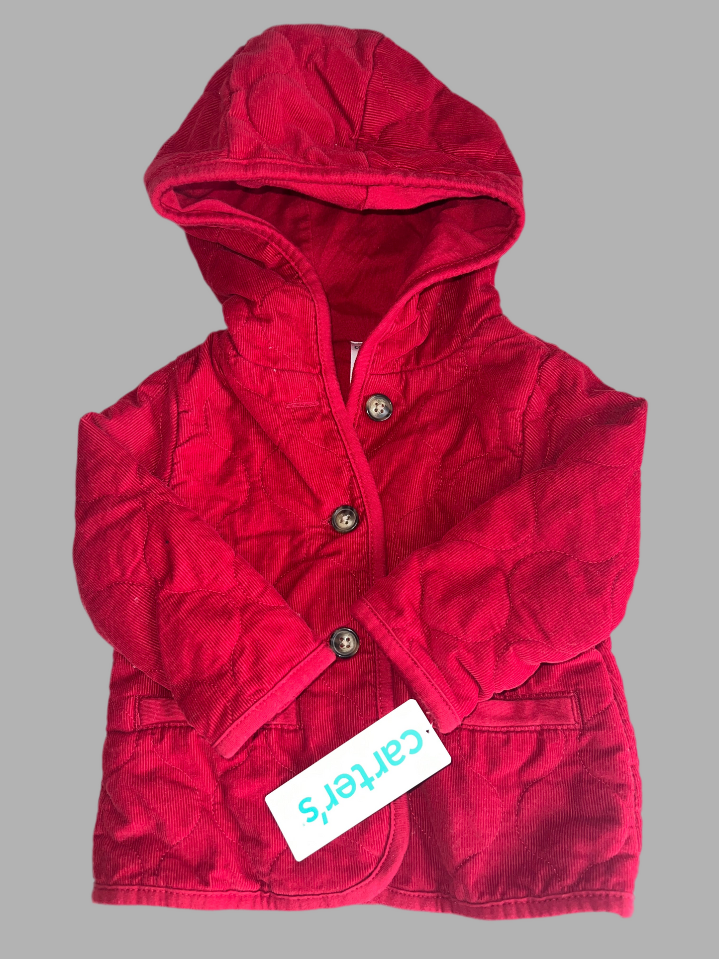 Chaqueta acolchada de pana con capucha para bebé roja